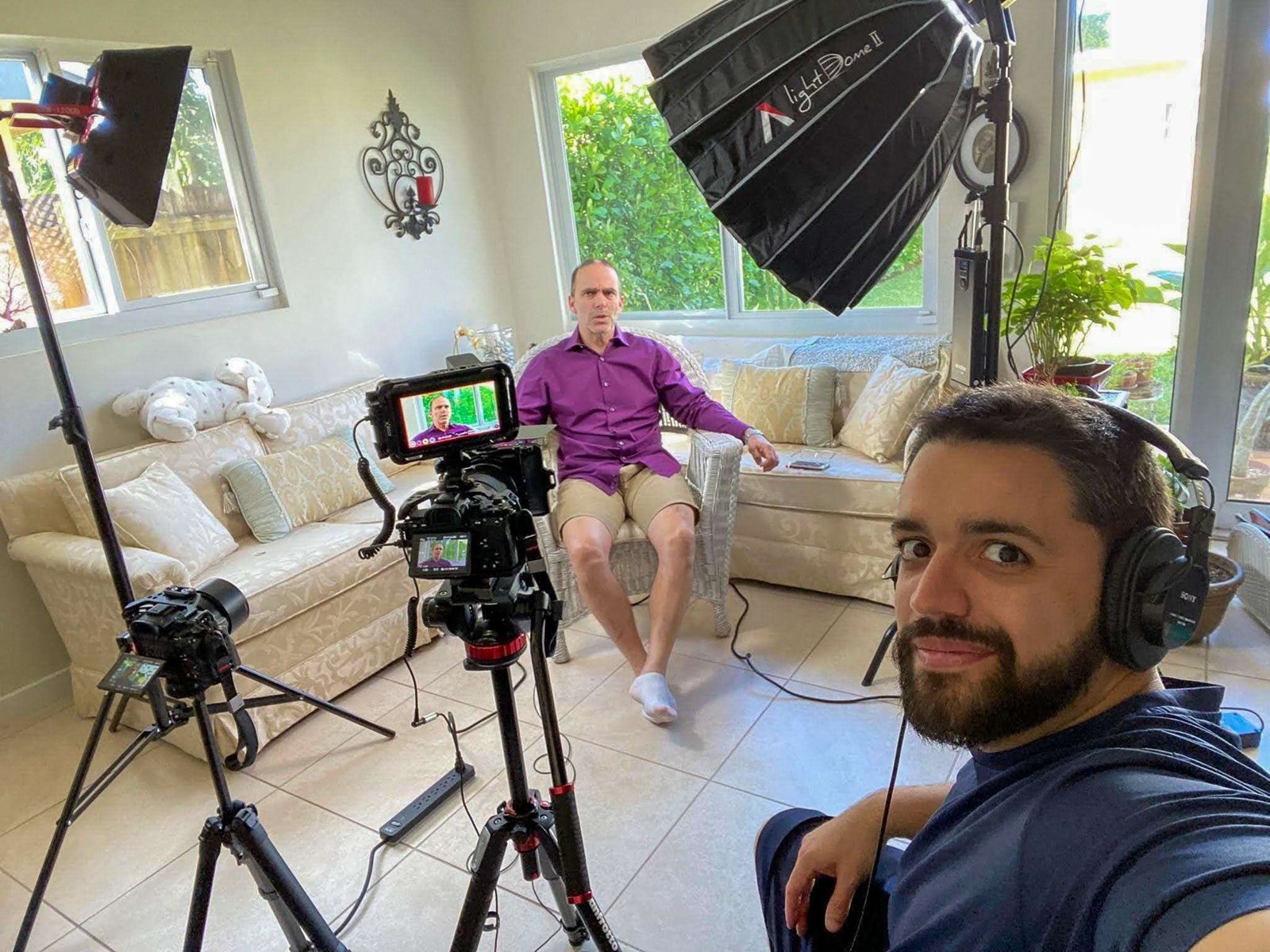 Two-camera interview shoot lit with softboxes on location
