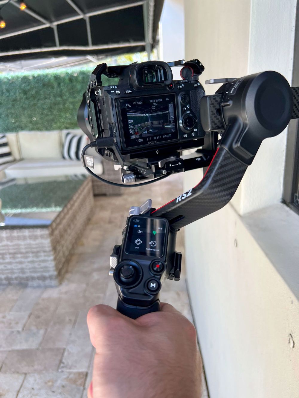 A mirrorless camera on a handheld gimbal, ready to roll