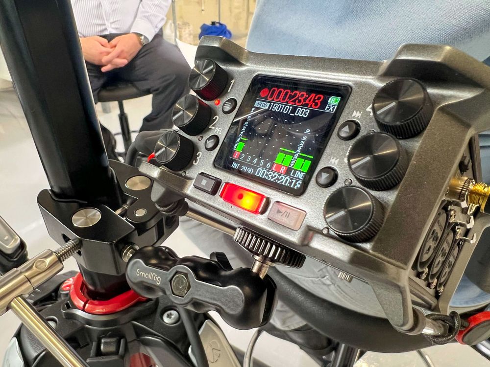 Close-up of an audio recorder mounted to a camera rig